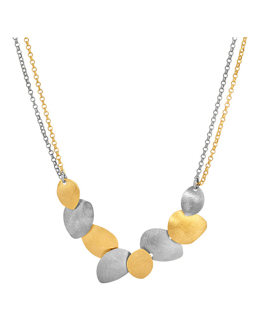 Necklace with gold and silver beads on a white background