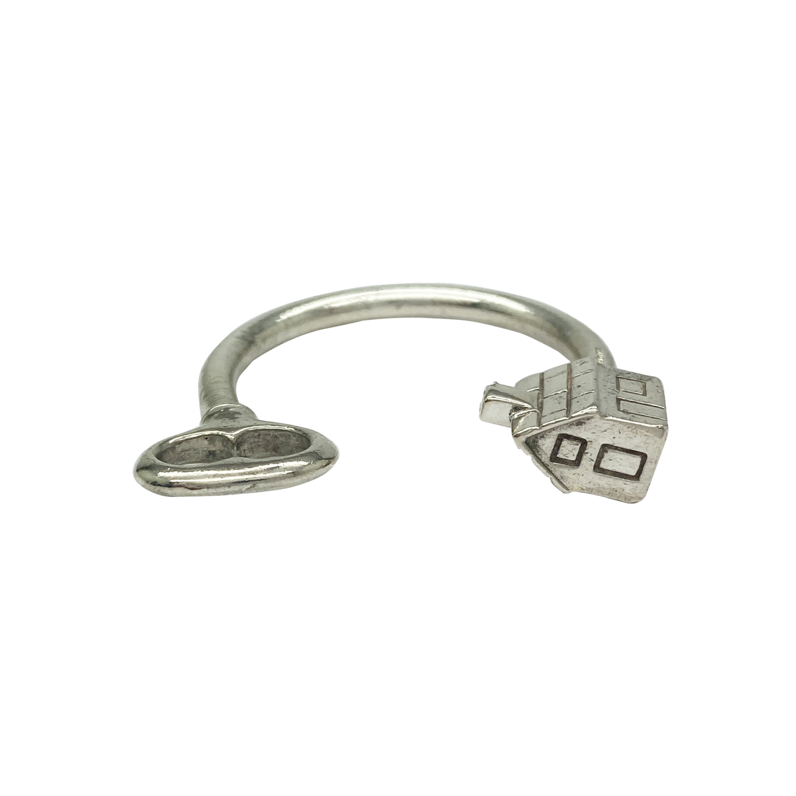 Silver keychain with house and key charms.