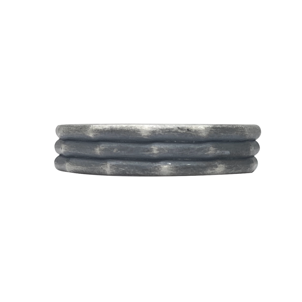 Gray stone coaster with a wavy pattern, on a white background.