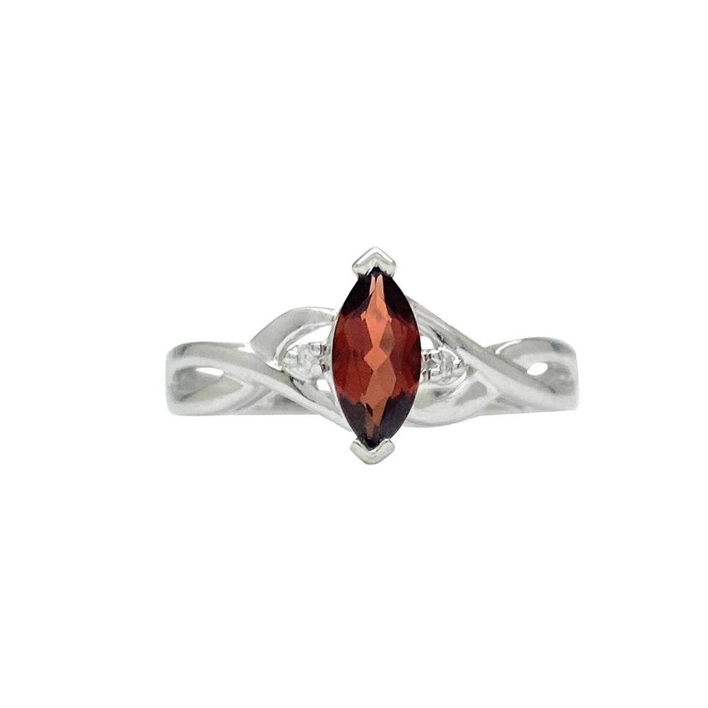 Silver ring with a marquise-cut garnet center stone and diamond accents, on a white background.