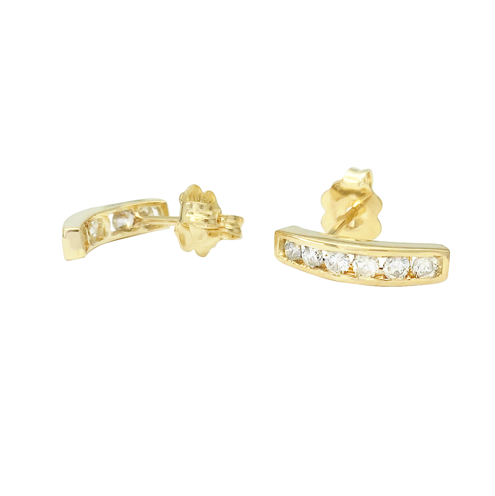 Gold hoop earrings with diamonds on a white background.