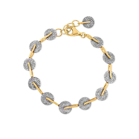 Bracelet with gold and silver beads on a white background