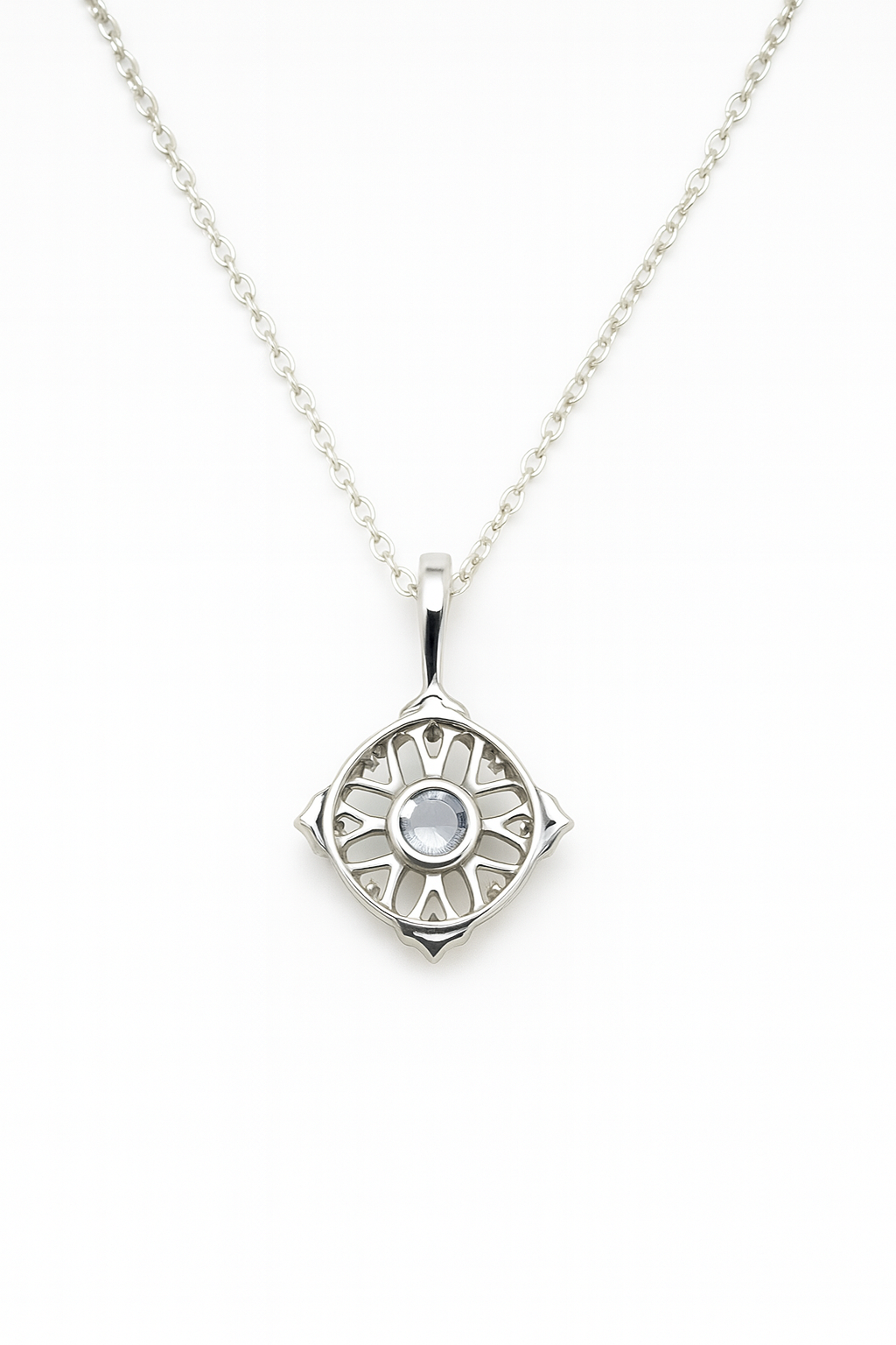 Silver pendant necklace on a white background
