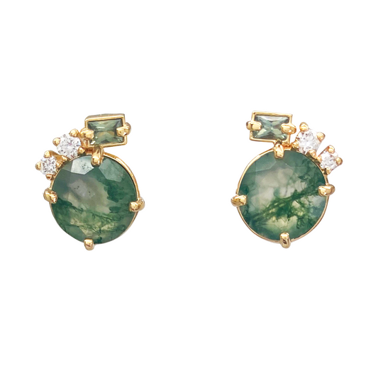 Pair of gold stud earrings featuring oval-shaped green moss agate gemstones, accented with smaller diamonds and green rectangular stones. The earrings are displayed against a white background.