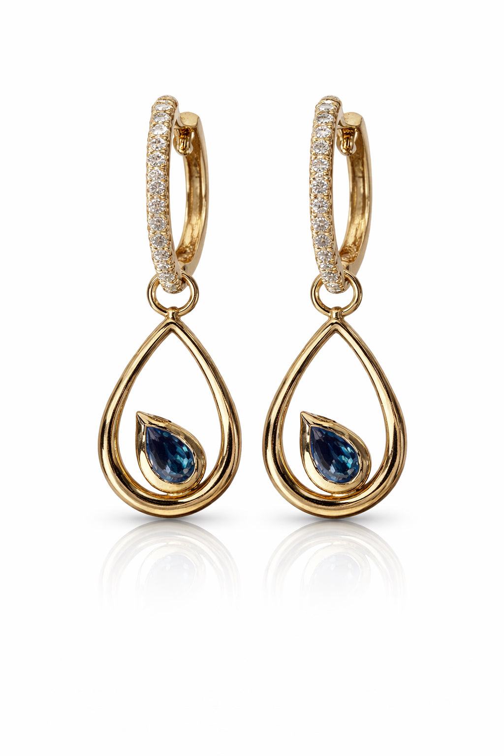 Gold hoop earrings with teardrop-shaped gemstones on a white background
