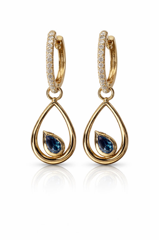 Gold hoop earrings with teardrop-shaped gemstones on a white background