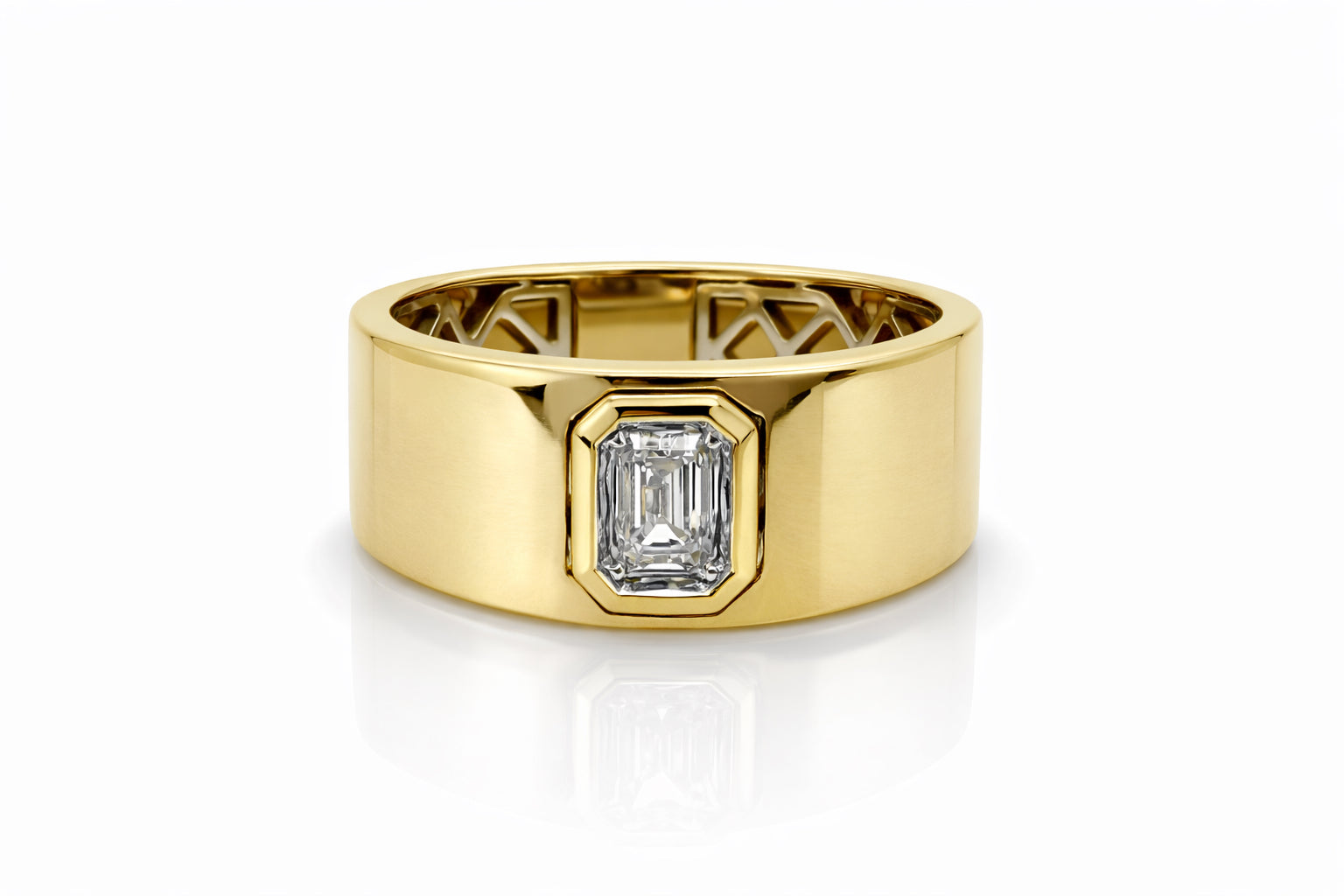 Gold ring with a diamond on a white background