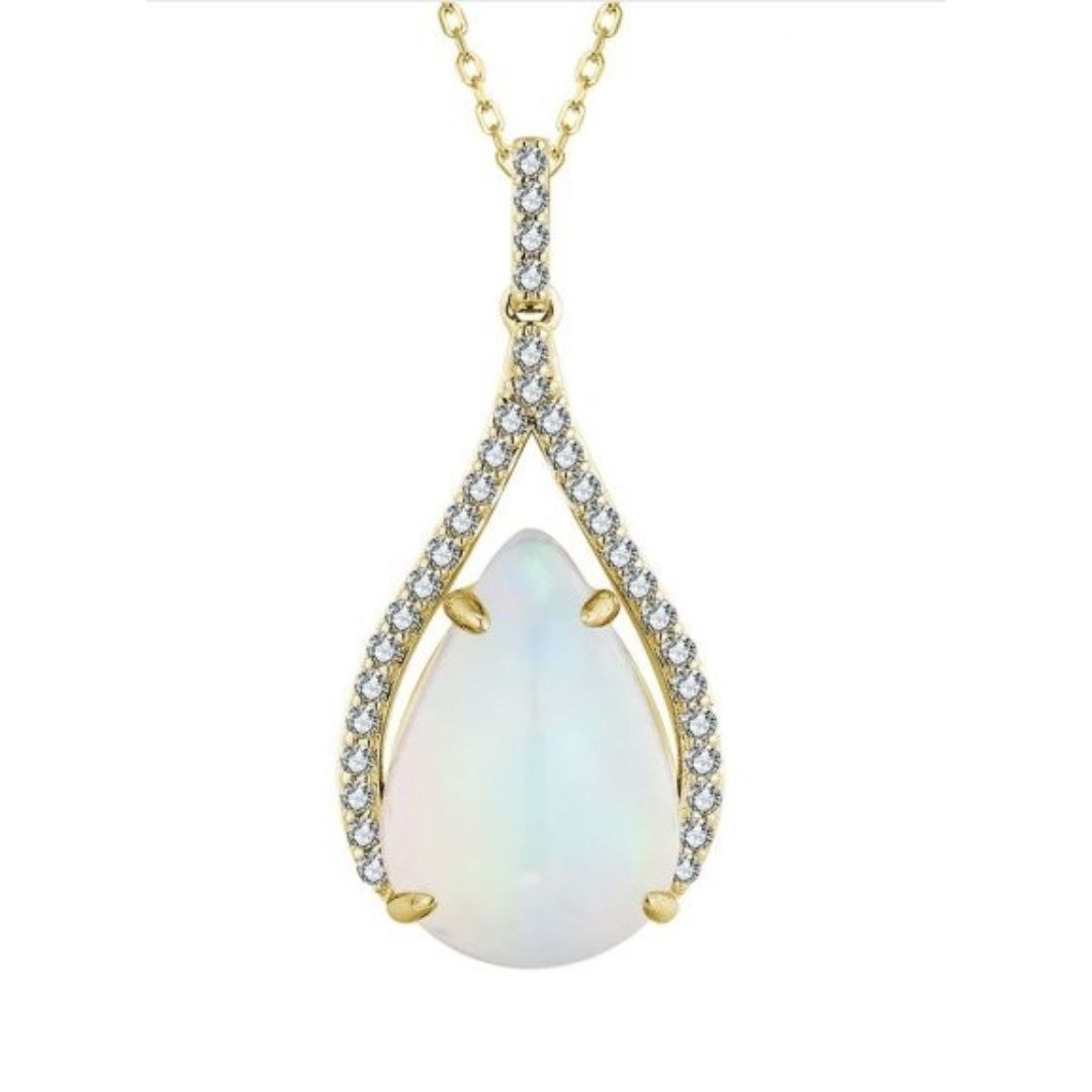 Teardrop-shaped opal pendant with gold frame and diamond accents on a white background