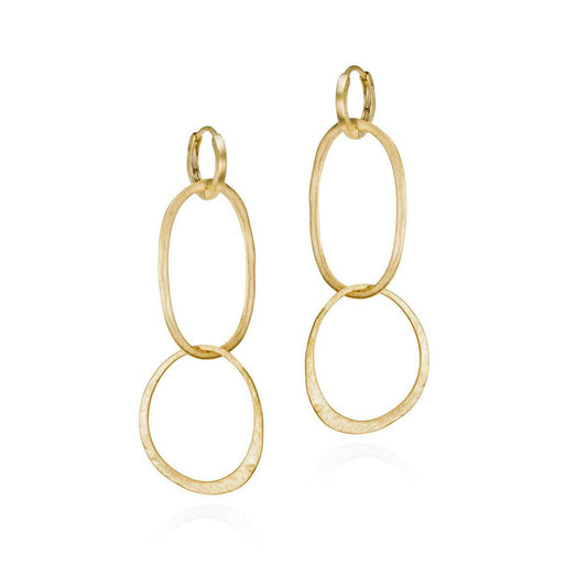 Gold hoop earrings on a white background