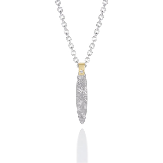 Silver Damascus necklace on a white background