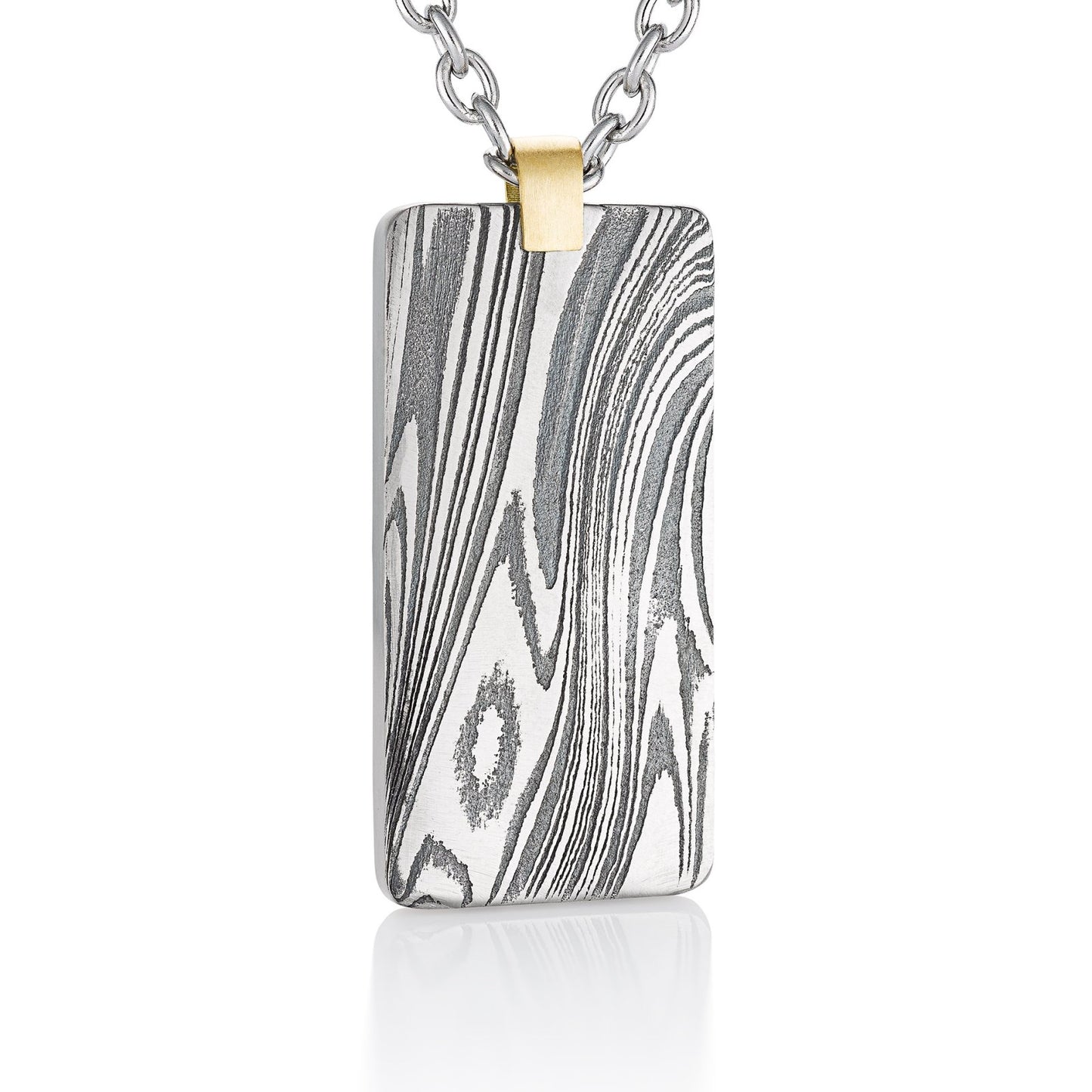 Silver Damascus necklace on a white background. 