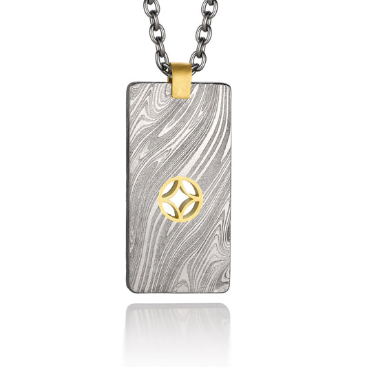 Silver shield-shaped Damascus necklace on a white background. 