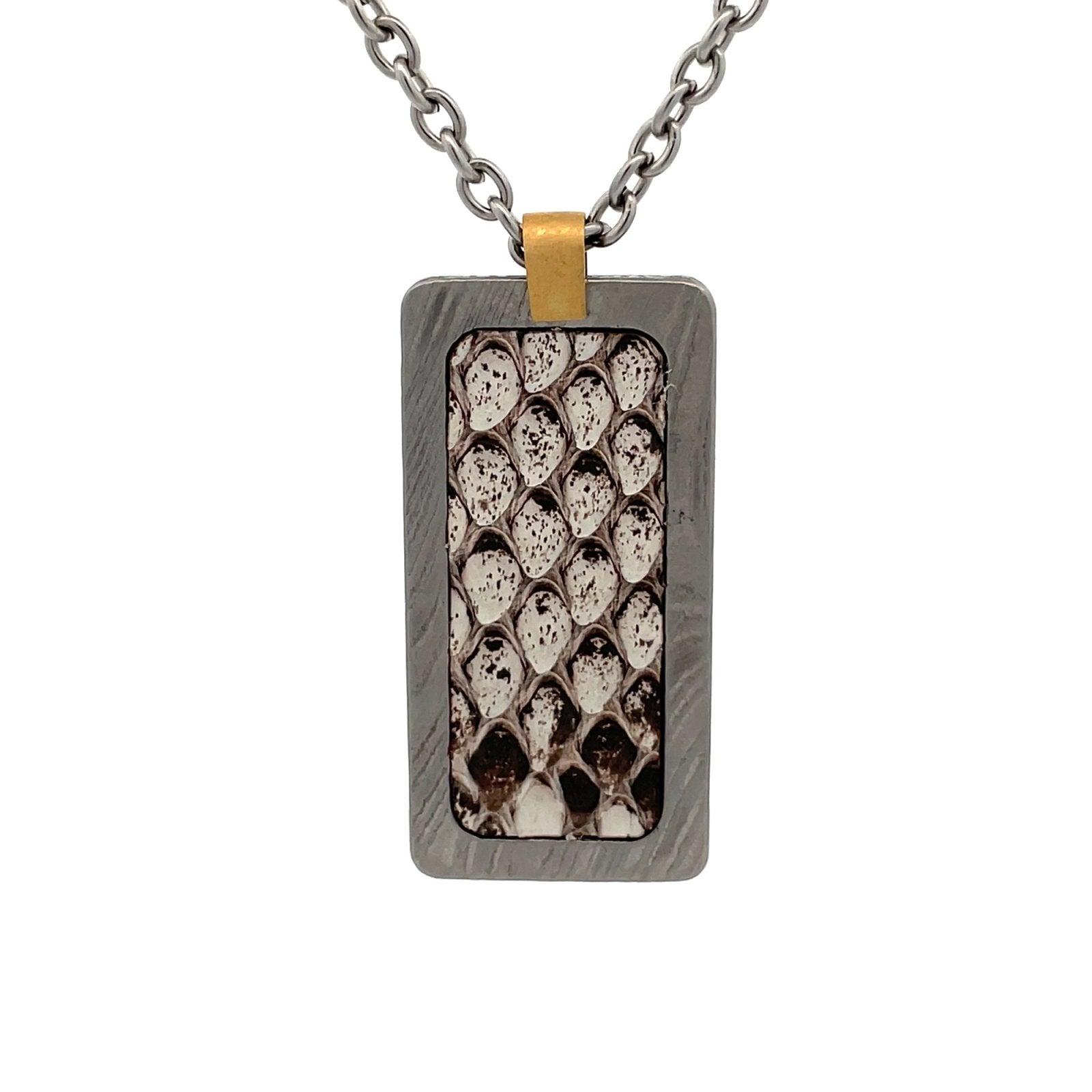 Silver rectangular pendant with a white and black snake skin pattern in the center, on a white background.