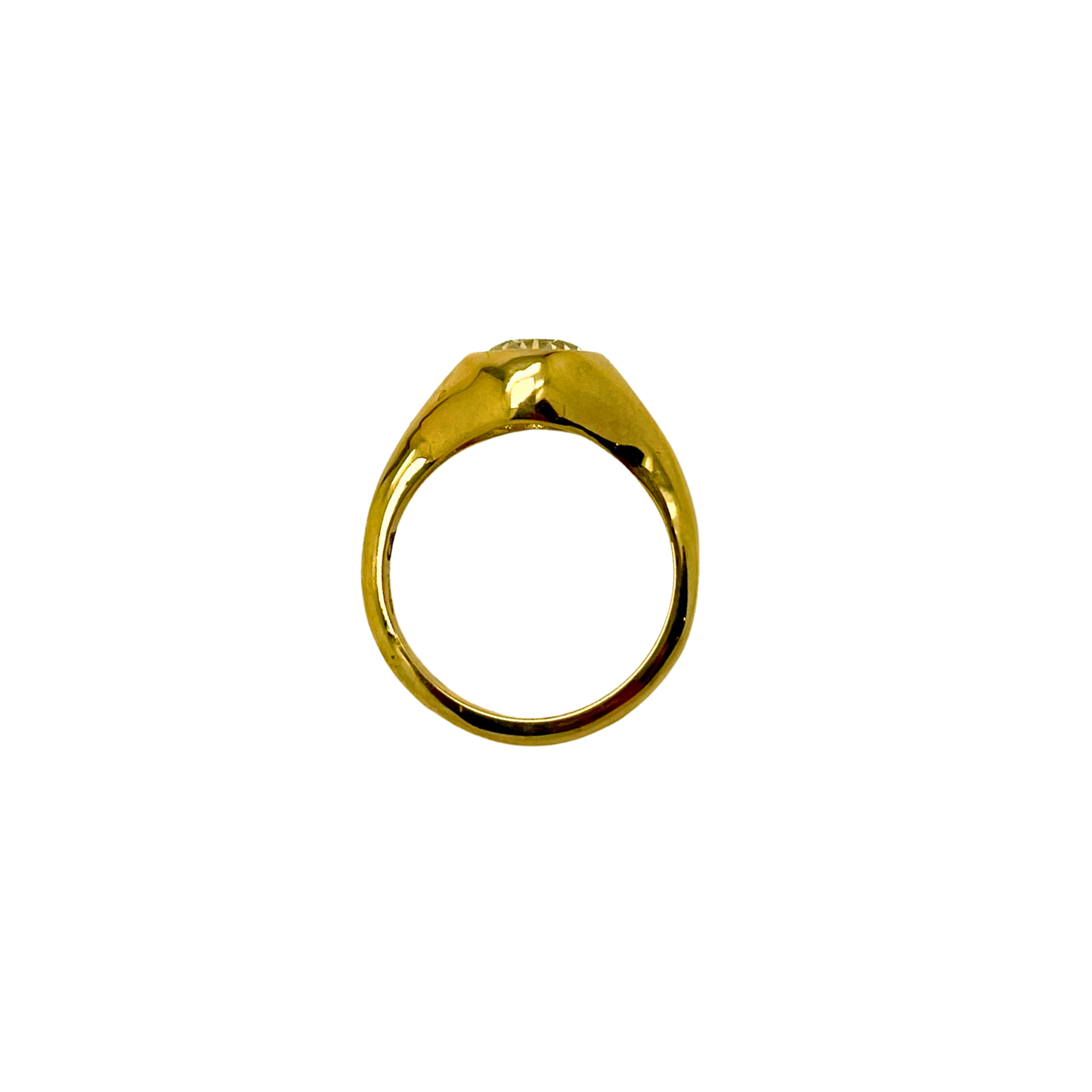Gold ring on a white background
