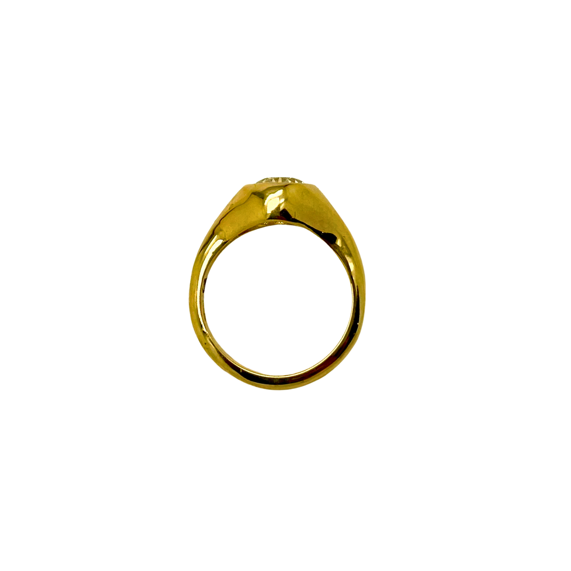 Gold ring on a white background
