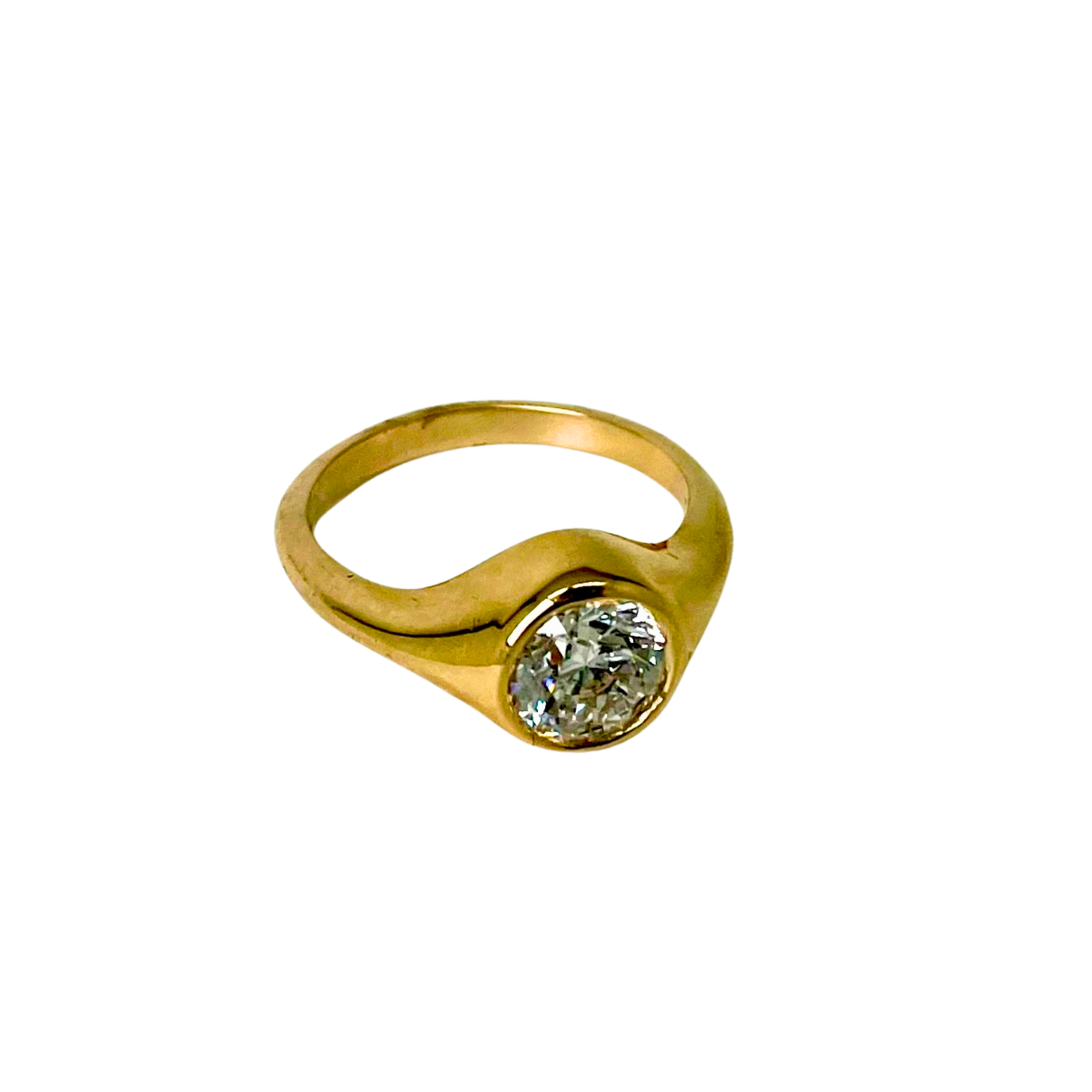 Gold ring with a diamond on a white background