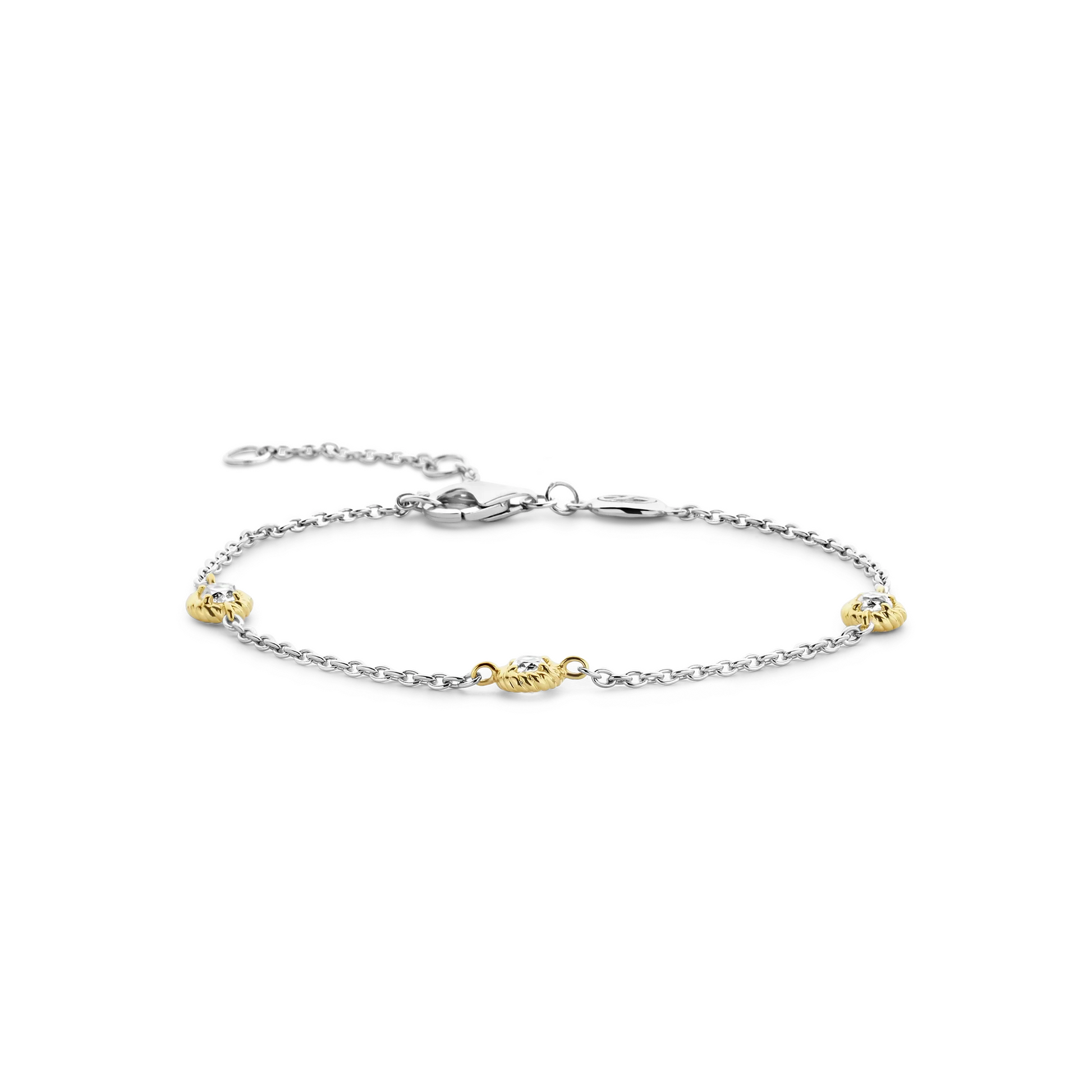 Bracelet with gold and silver charms on a white background
