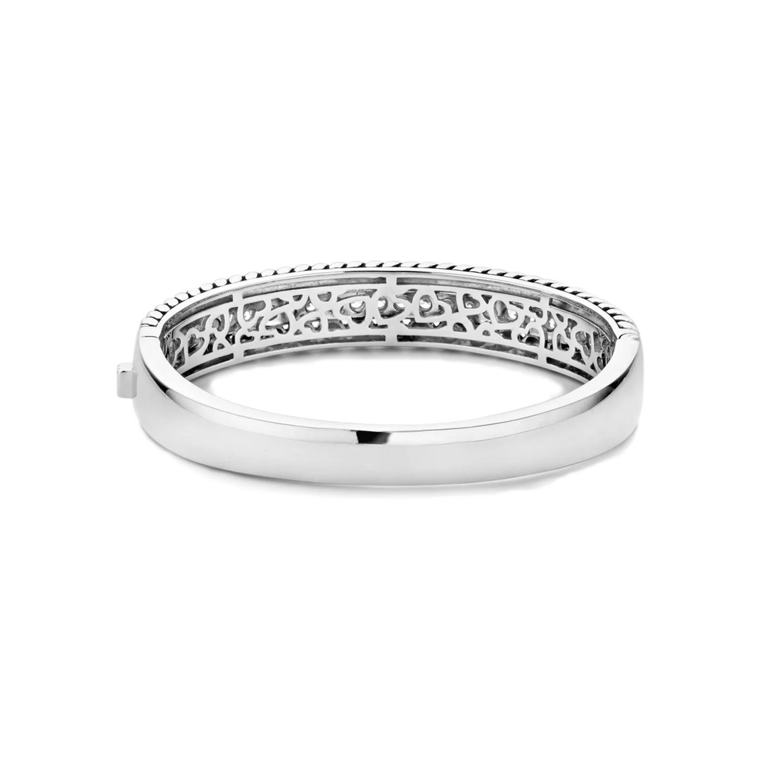 Silver bracelet with intricate design on a white background