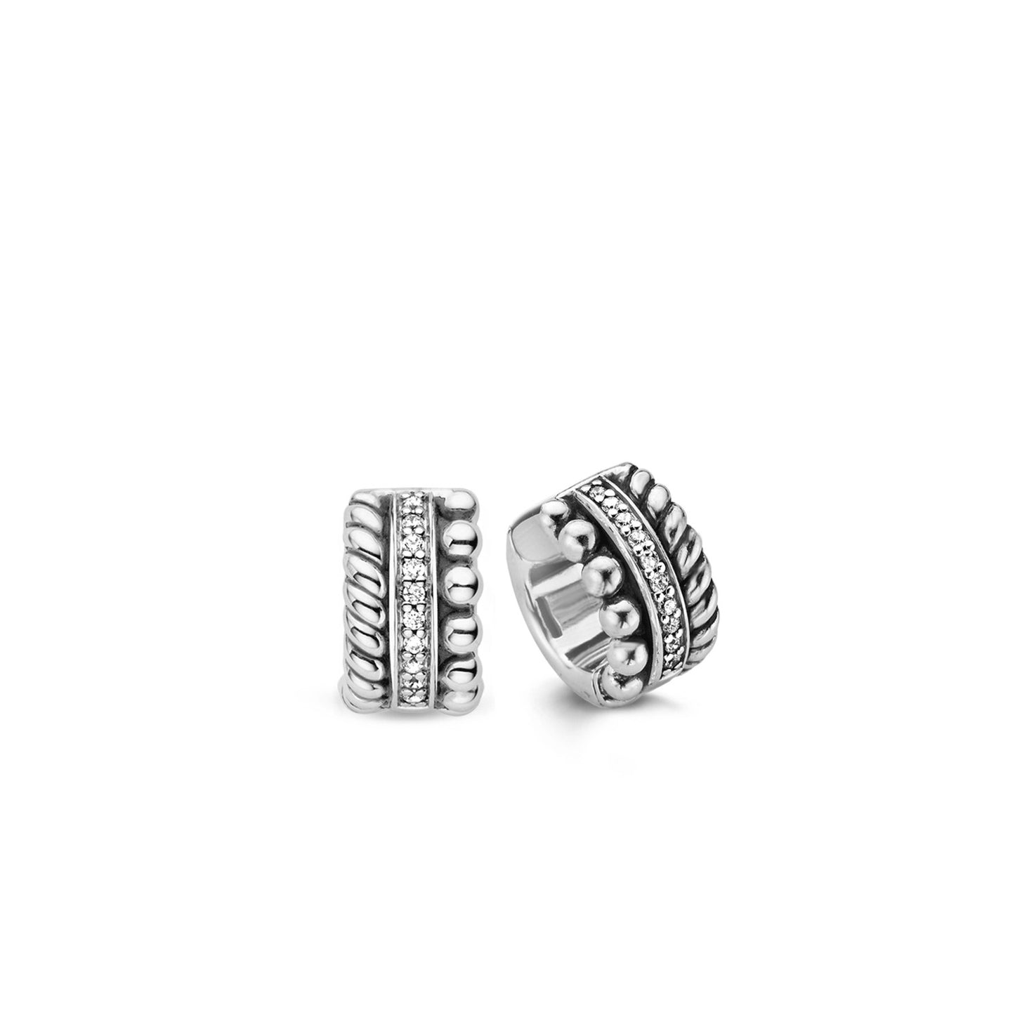 Two silver hoop earrings with intricate designs on a white background