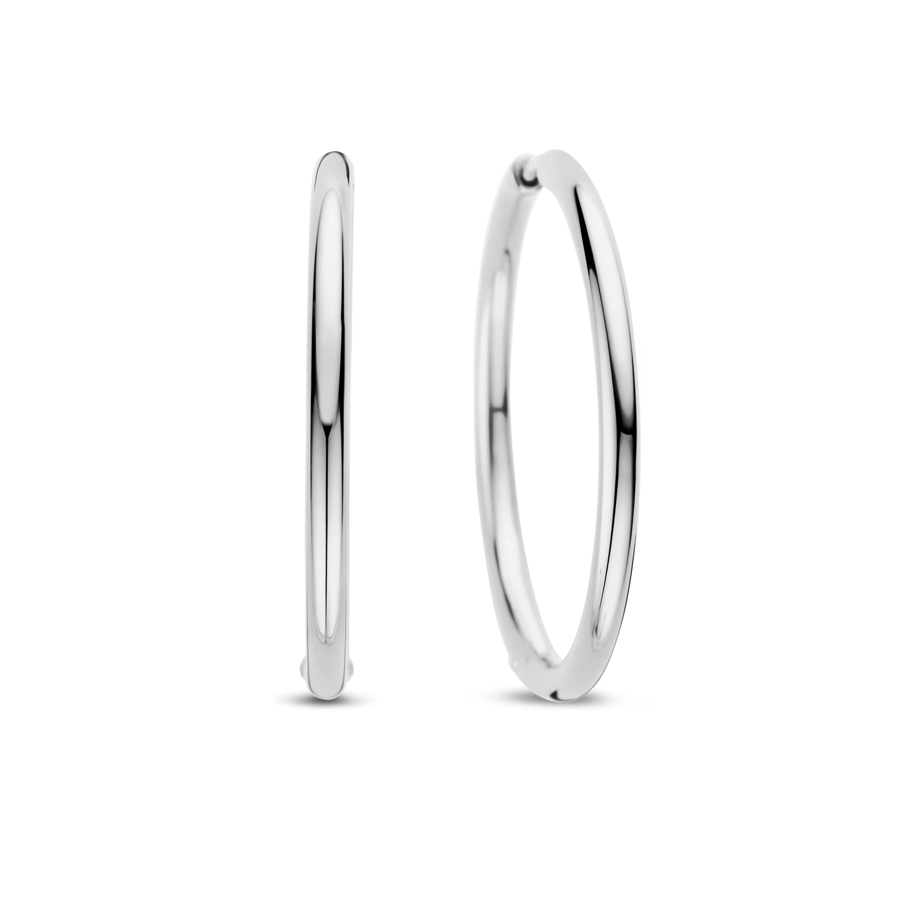 Silver hoop earrings on a white background