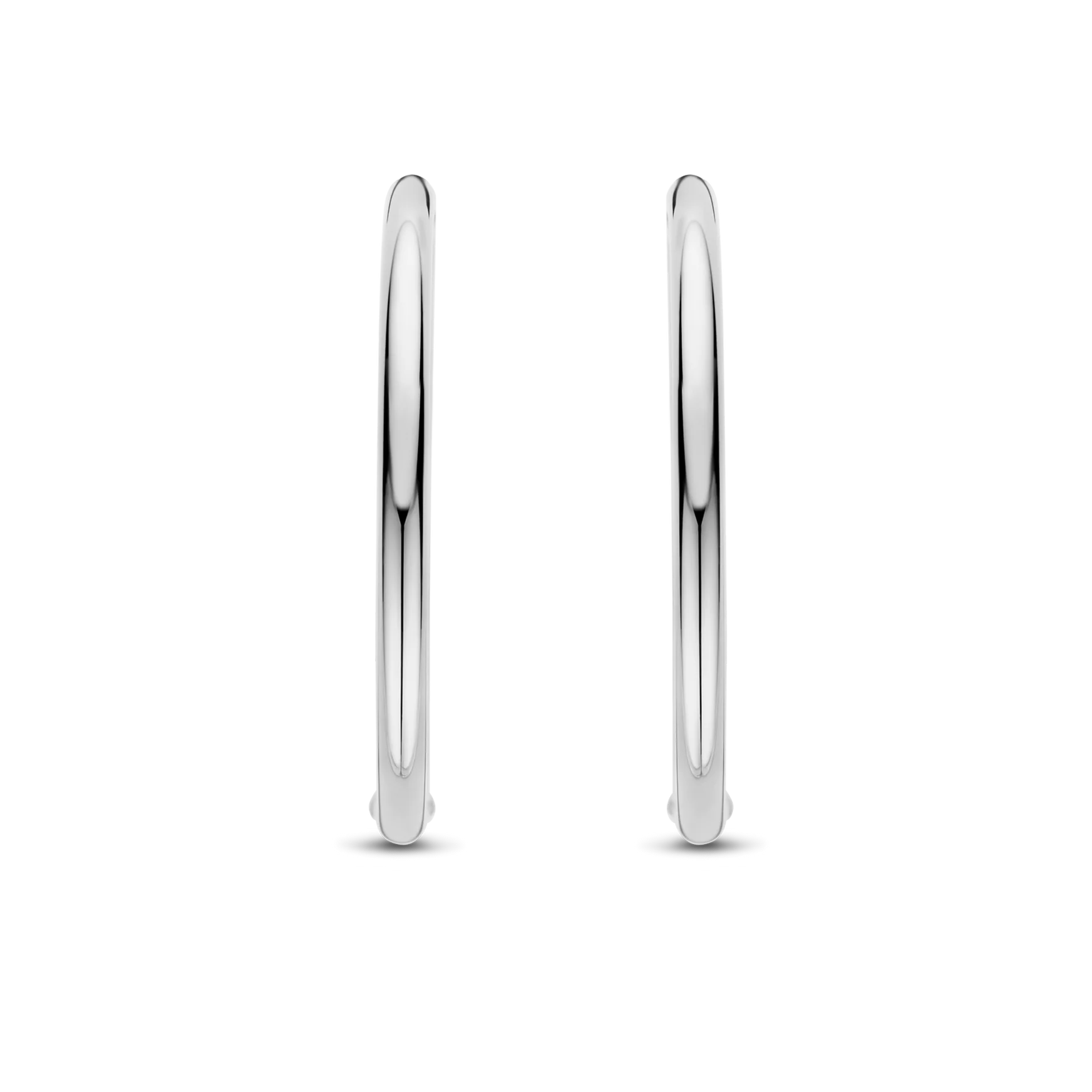 Pair of silver hoop earrings on a white background
