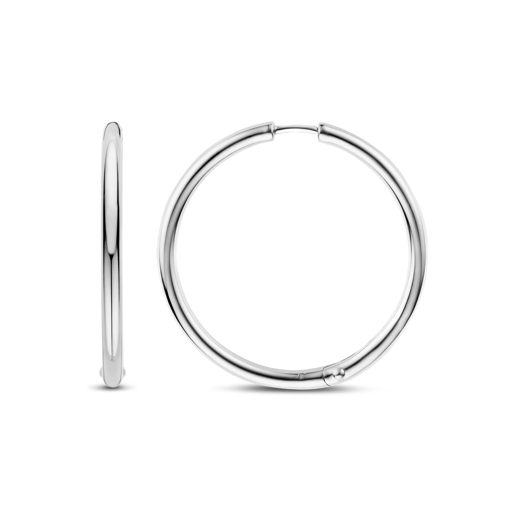 Silver hoop earrings on a white background