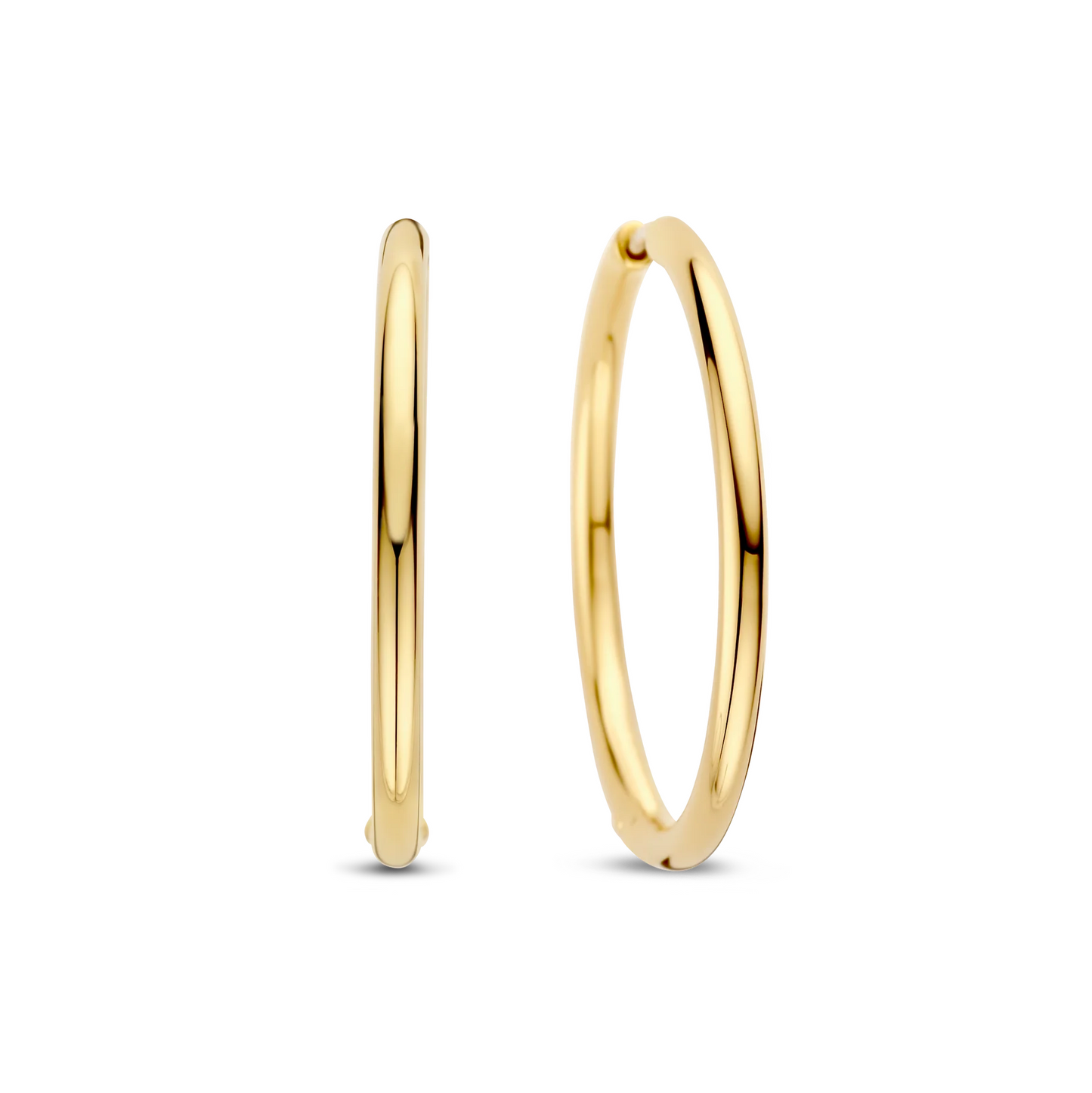 Gold hoop earrings on a white background