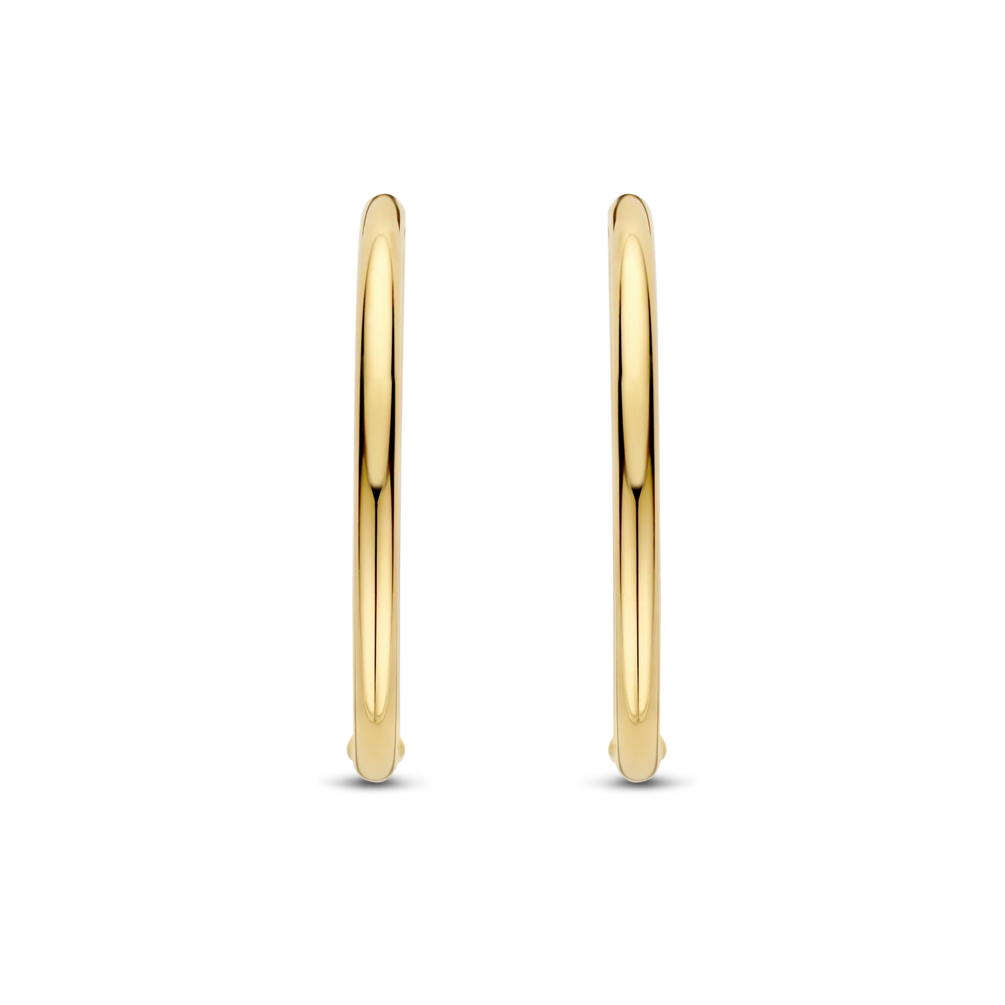 Gold hoop earrings on a white background