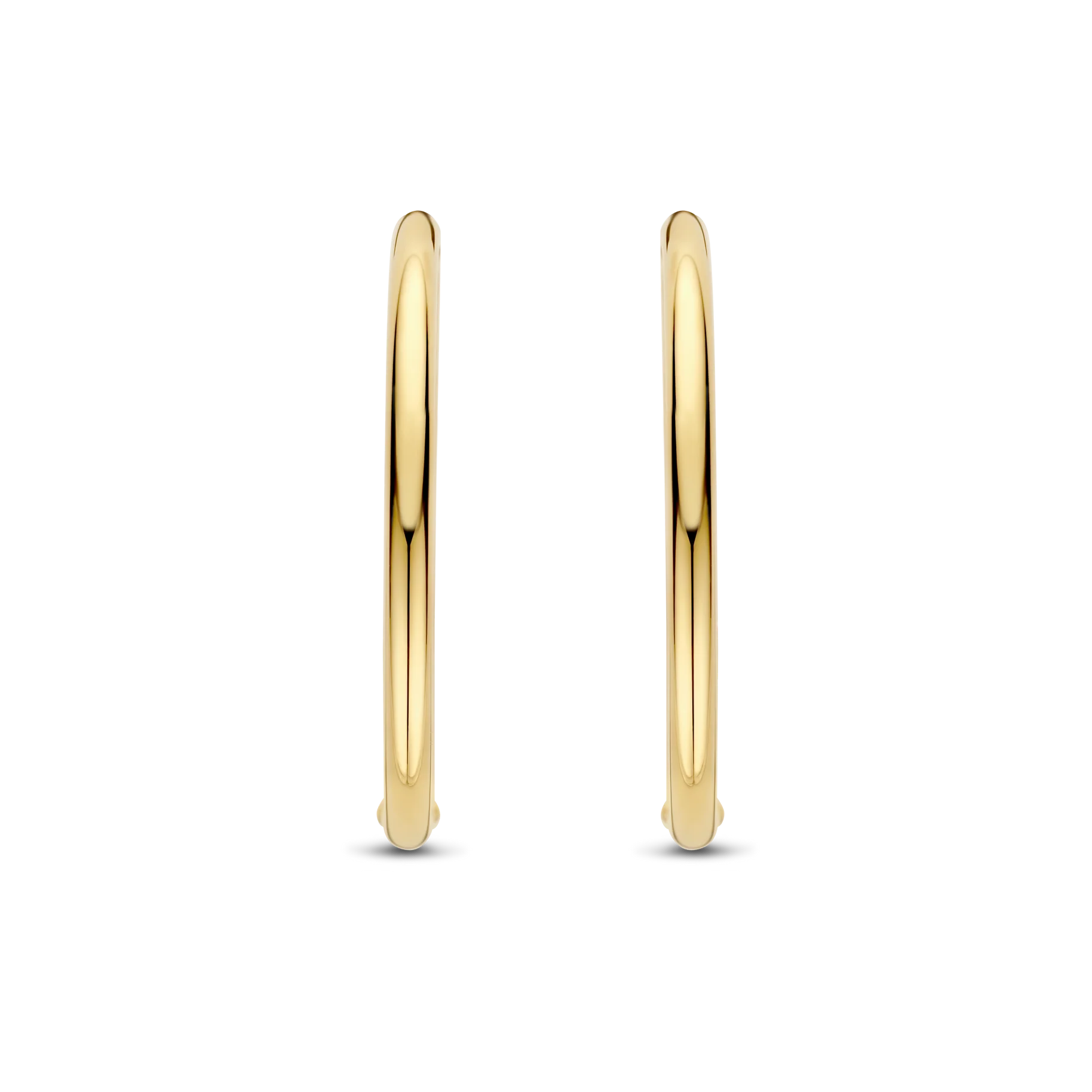 Gold hoop earrings on a white background