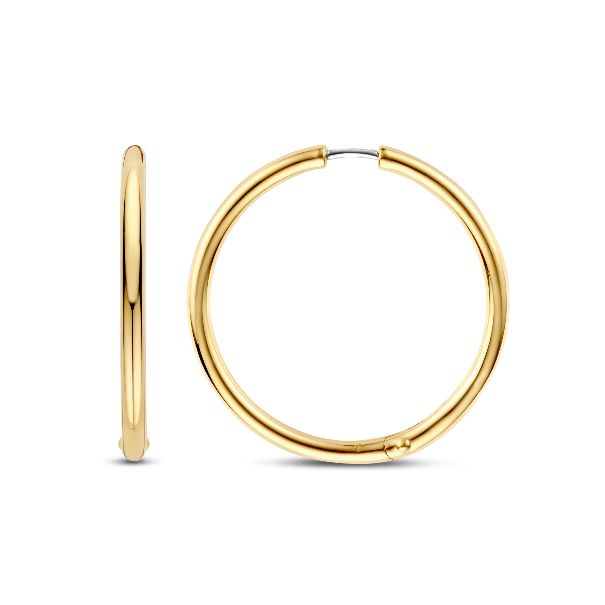 Gold hoop earrings on a white background