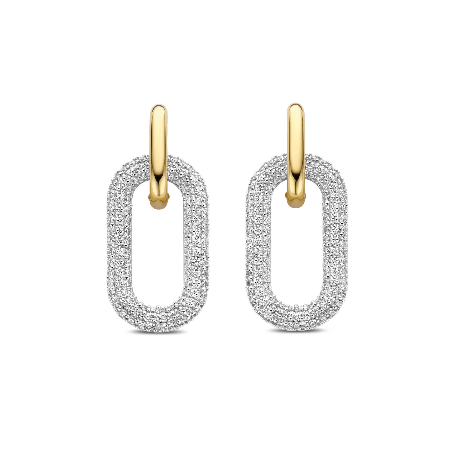 Gold and silver hoop earrings on a white background