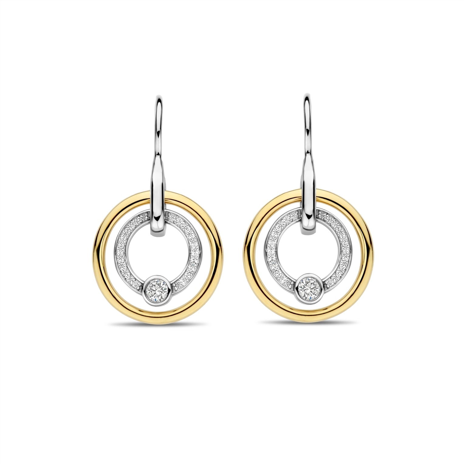 Pair of gold and silver hoop earrings on a white background