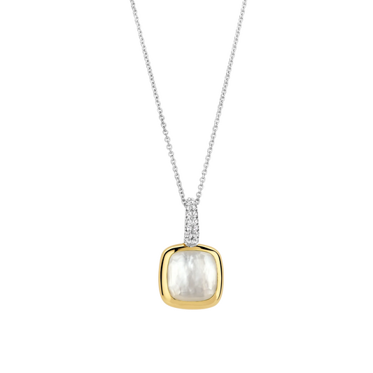 Necklace with a gold and silver pendant on a white background
