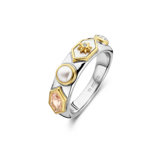 Silver and gold ring with gemstones on a white background