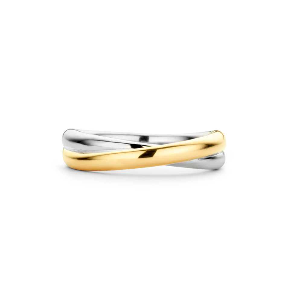 Two-toned gold and silver ring on a white background