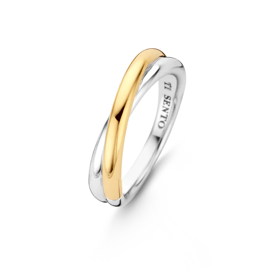 Two-tone gold and silver ring on a white background