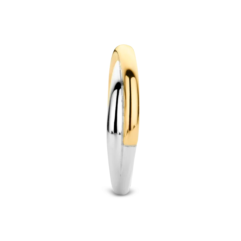 Two-tone gold and silver ring on a white background