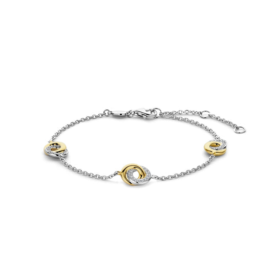 Two-tone bracelet with interlocking circular designs on a white background