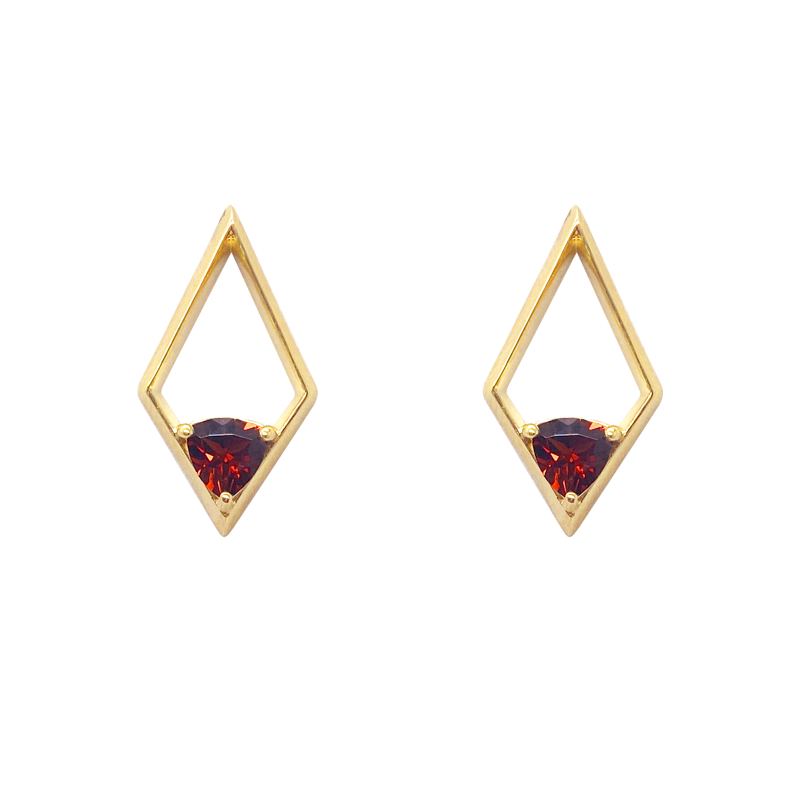 Pair of gold stud earrings with a triangular shape and a red gemstone in the center on a white background.