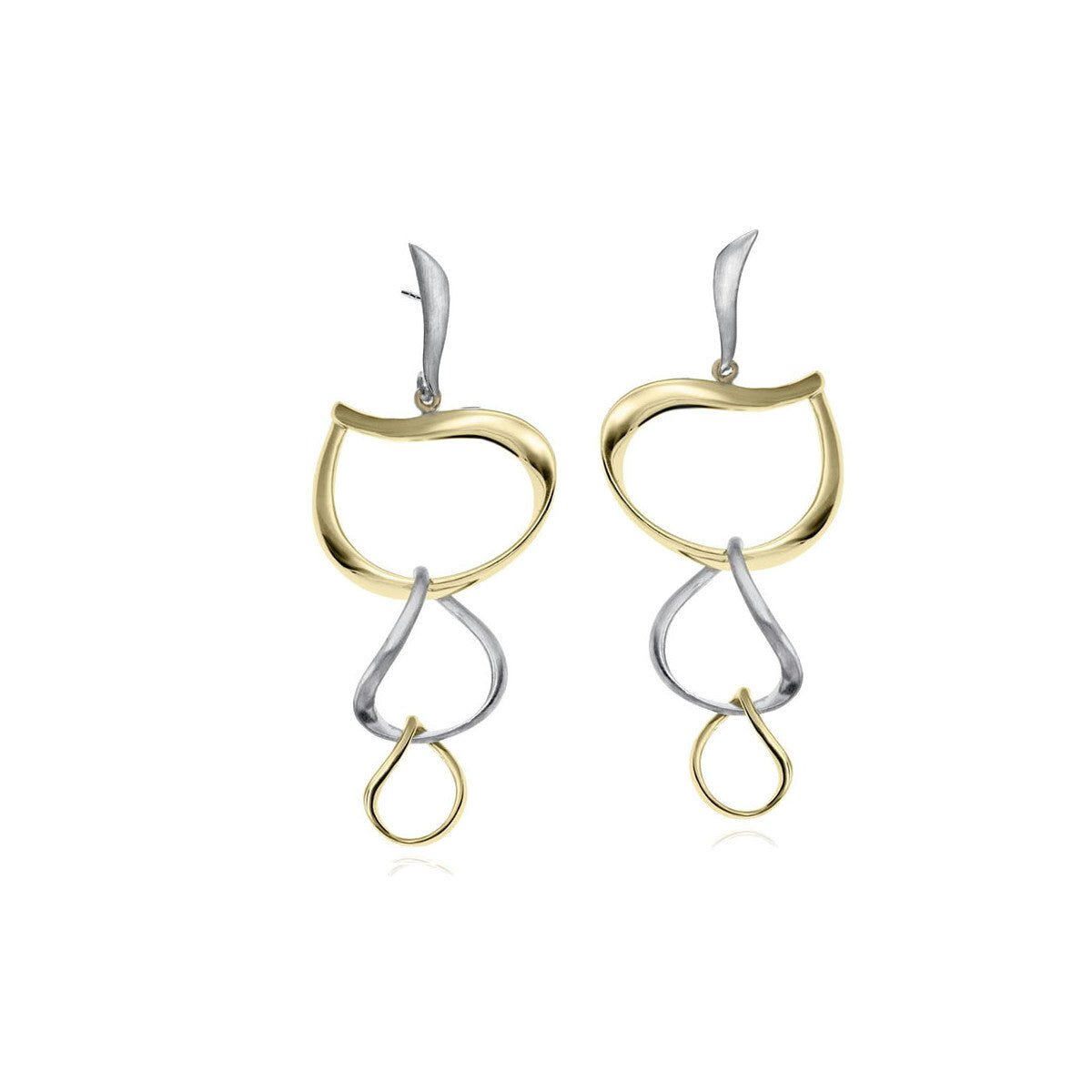 Pair of gold and silver earrings on a white background