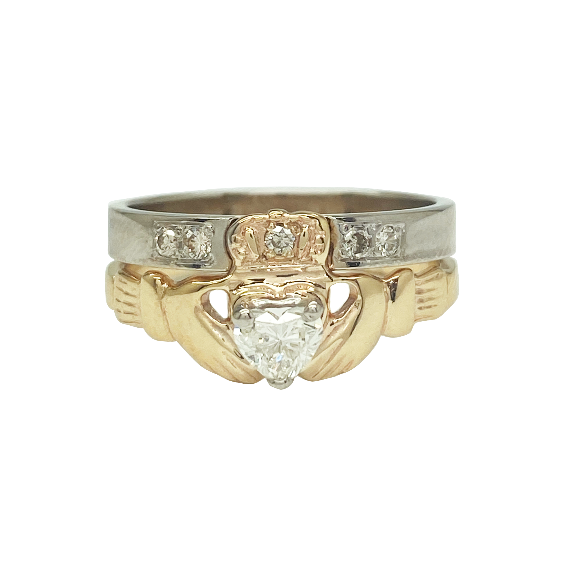 Two-tone gold diamond Claddagh ring set on a white backgorund