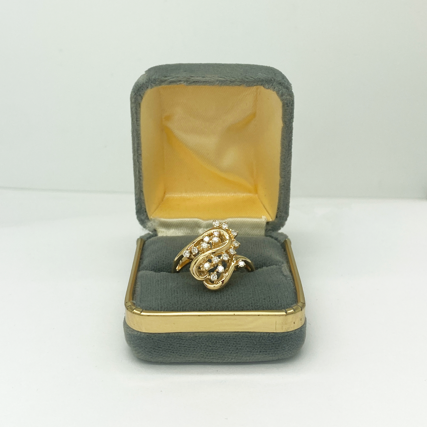 Yellow gold ring on ring box 